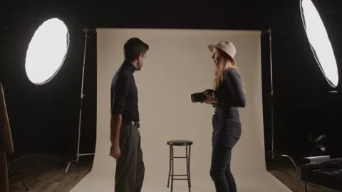 Photographer Talks To Model On Set Stock-Footage 270396418
