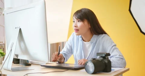 Photographer use graphics tablet Stock Footage 232449293