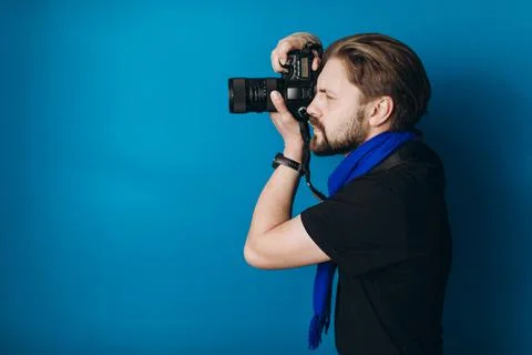 Photographer using camera for picture 스톡 사진