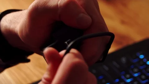 Photographer using Dslr camera and laptop to download his files to the computer. Stock Footage 116128131