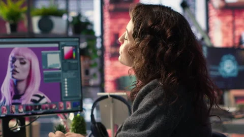 Photographer using modern editing program to create high quality photos Stock Footage 308606170