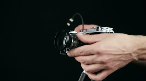 Photographer using a retro old camera Stock Footage 62132026