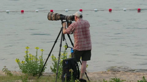 Photographer at work with camera on tripod Video stock 52360628