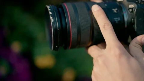 Photographer at work during the day outside Stock Footage 229690007
