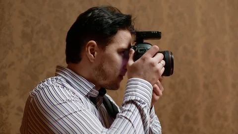 Photographer work with model Stock Footage 75707907