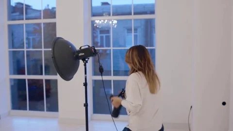 Photographer work with model in studio. Backstage. Stock Footage 77028116