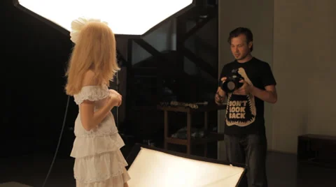 Photographer work with model in studio Stock Footage 34200778