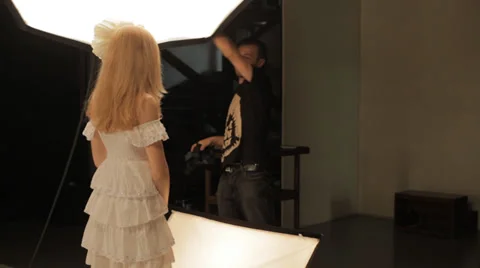 Photographer work with model in studio Stock Footage 34201145