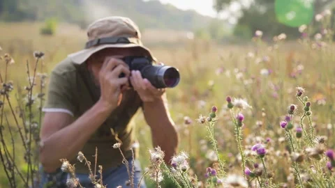 Photographer working in the outdoor Stock Footage 304992016