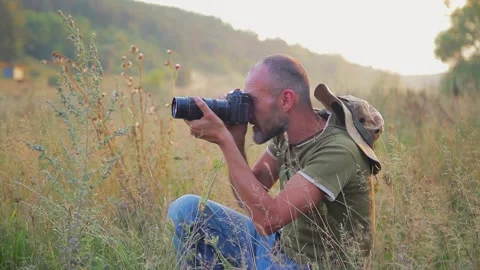 Photographer working in the outdoor Stock Footage 304992201