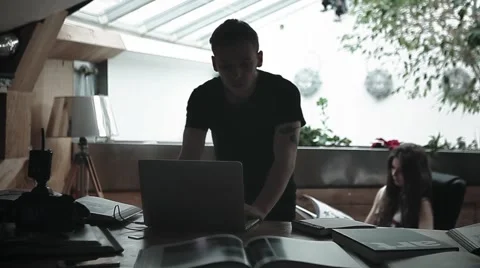 Photographer is working in studio Stock Footage 64566729