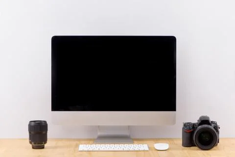 Photographer workspace mockup with desktop computer screen isolated. Stock Photos