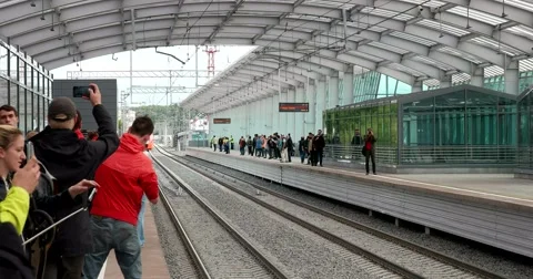 Photographers, arrival of the first train at the opening of a new subway line Stock Footage 67467960