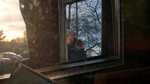 Photographer's reflection Video stock 98259933