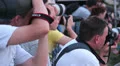 Photographers taking long range photos of event HD Footage
