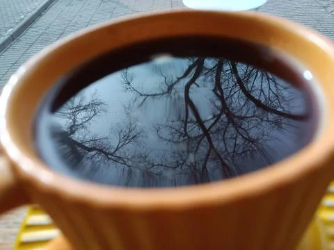 Photographic technique. Reflection on coffee. Stock Photos