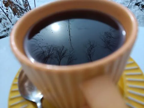 Photographic technique. Reflection on coffee. Stock Photos