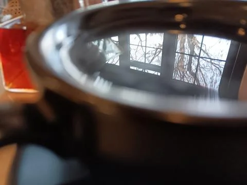 Photographic technique. Reflection on coffee. Stock Photos