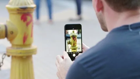 Photographing graffitied water hydrant Video stock 77049494