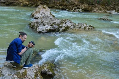 Photographing a mountain river Stock Photos