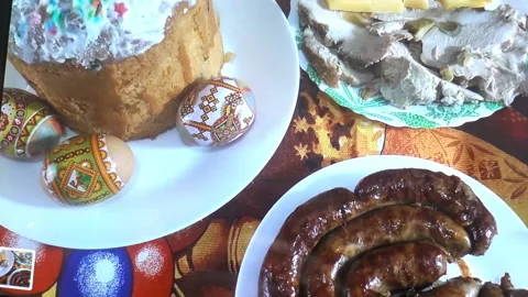 Photographing a tablet with a traditional Easter table. Stock Footage 129290778