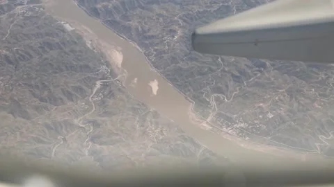 Photographing the Yellow River from the plane Stock Footage 235134979