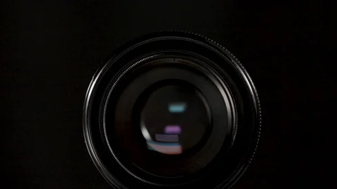Photography lens macro close up camera gear. Zooming in on camera lens isolated  Stock Footage 116555599