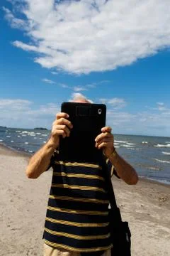 Photography of a man using tablet Stock Photos