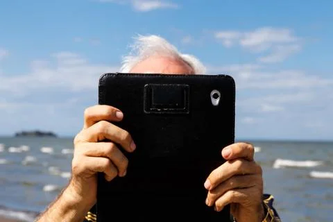 Photography of a man using tablet Stock Photos