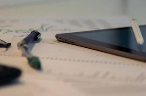 Photography of an office table with different objects. Stock Photos