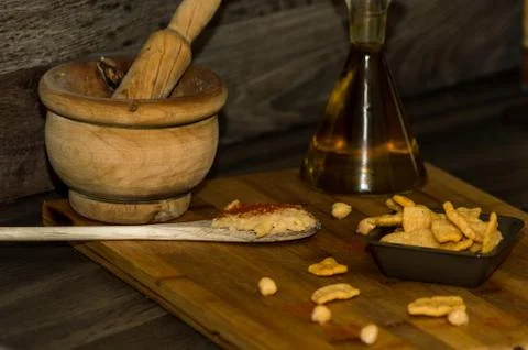 Photography of some chickpea chips with olive oil and paprika. Stock Photos