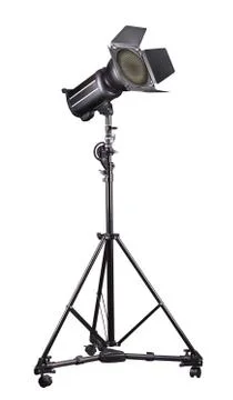 Photography studio flash on a lighting stand isolated on white background. Stock Photos