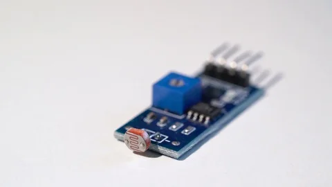 Photoresistor for detecting light. Electronics components for diy engineering Stock Footage 129717333