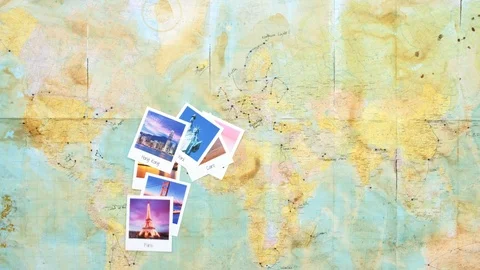 Photos dropping onto an old map Video stock 89352302