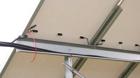 Photovoltaic panel installation process showcasing sequential connection of Stock Footage 319529584