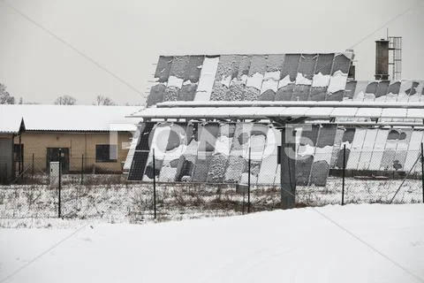 Photovoltaic panels covered by snow Stock Photos