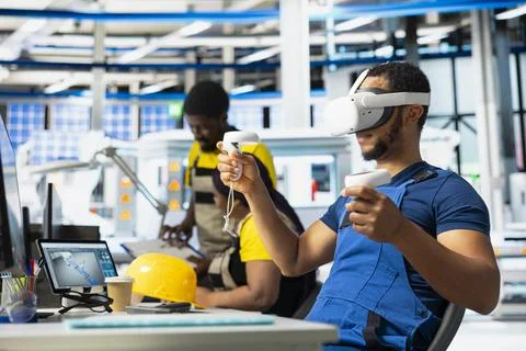 Photovoltaics facility engineer using VR tech to build generators for solar cell Stock Photos