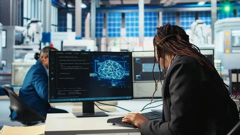 Photovoltaics factory programmer analyzing data using artificial intelligence Stockfoto's