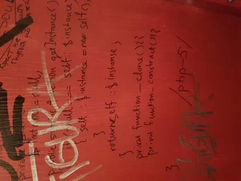 PHP code graffiti on a red wall 스톡 사진