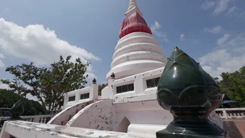 Phra Chedi Klang Nam white pagoda in Rayong Thailand reveal shot Stock Footage 333147541