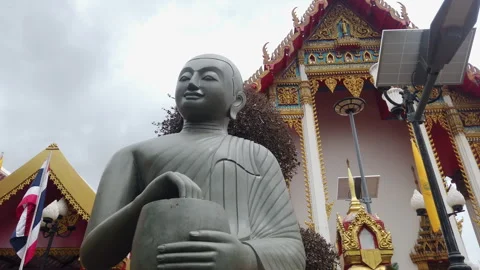 Phra Upagupta statue in front of the Buddhist temple Stock Footage 283727959