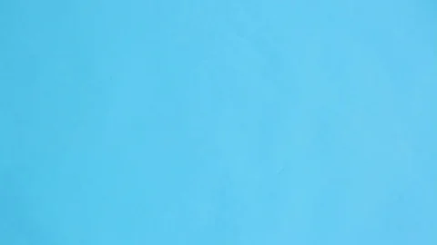 Phrase "do it now" it is written from sand on the blue screen Stock Footage 80290838