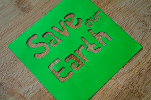 Phrase of Earth day. Saving our earth, go green, recycle symbol concept backg Stock Photos