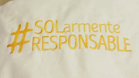 Phrase embroidered in yellow thread on a blanket Stock Footage 287976138