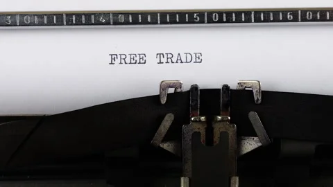 The phrase FREE TRADE is typing on a retro typewriter. Stock Footage 314582525