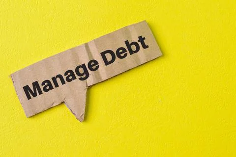 Phrase MANAGE DEBT on bubble speech note. Financial concept Foto stock