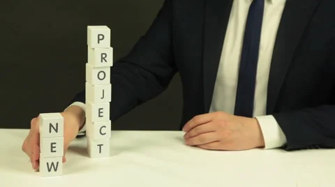 Phrase 'New Project ' Out of Cubes Stock Footage 62346595