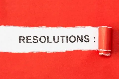 The phrase RESOLUTIONS behind torn paper Stock Photos