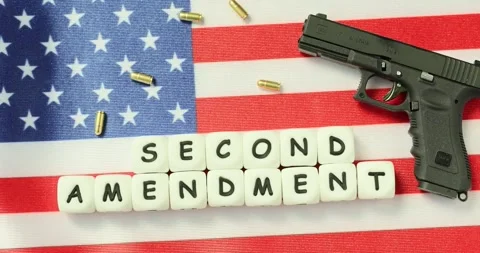 Phrase Second Amendment of white blocks near handgun Stock Footage 301071118