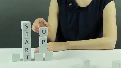 Phrase 'Start Up ' Out of Cubes Stock Footage 62825636